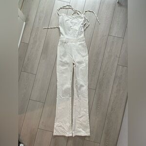 Pann White denim jumpsuit with adjustable straps